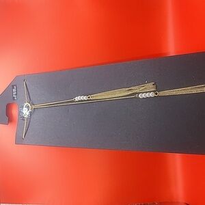 Long faux pearl and gold tone necklace